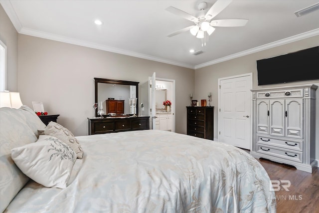 bedroom with dark wood-type flooring, ceiling fan, ornamental molding, and ensuite bath