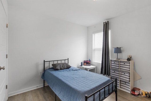 32299 Terranova Loop, Lillian, AL 36549 - bedroom featuring wood finished floors and baseboards