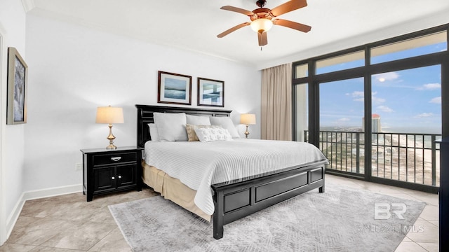 23450 Perdido Beach Blvd Unit 2011, Orange Beach, AL 36561 - bedroom featuring light tile patterned flooring, access to exterior, multiple windows, a wall of windows, and crown molding