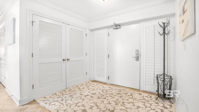 23450 Perdido Beach Blvd Unit 2011, Orange Beach, AL 36561 - foyer entrance featuring crown molding and light tile patterned floors