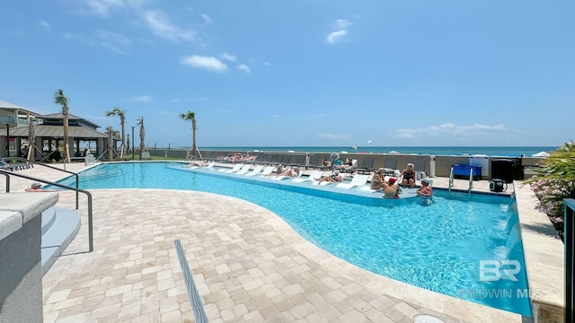 23450 Perdido Beach Blvd Unit 2011, Orange Beach, AL 36561 - community pool featuring a gazebo, a patio area, and a water view