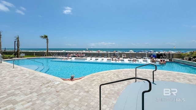 23450 Perdido Beach Blvd Unit 2011, Orange Beach, AL 36561 - community pool with a water view and a patio area