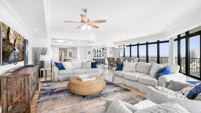 23450 Perdido Beach Blvd Unit 2011, Orange Beach, AL 36561 - living area with a chandelier, ceiling fan, and ornamental molding