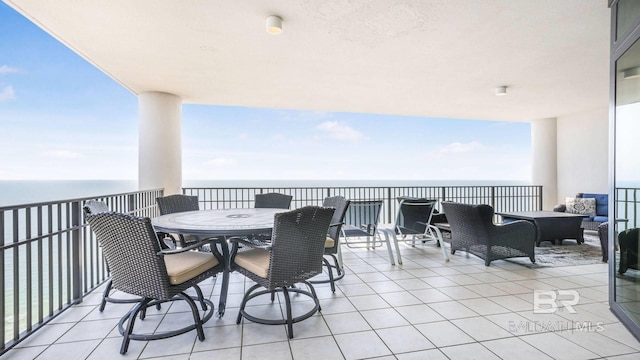 23450 Perdido Beach Blvd Unit 2011, Orange Beach, AL 36561 - patio / terrace with a water view and outdoor dining area