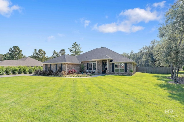 ranch-style house with a front lawn