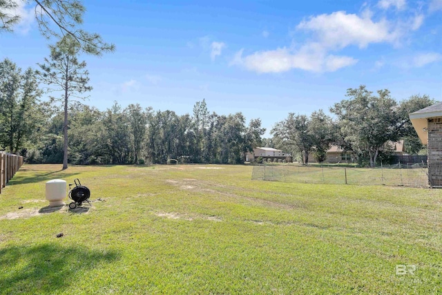 view of yard featuring fence