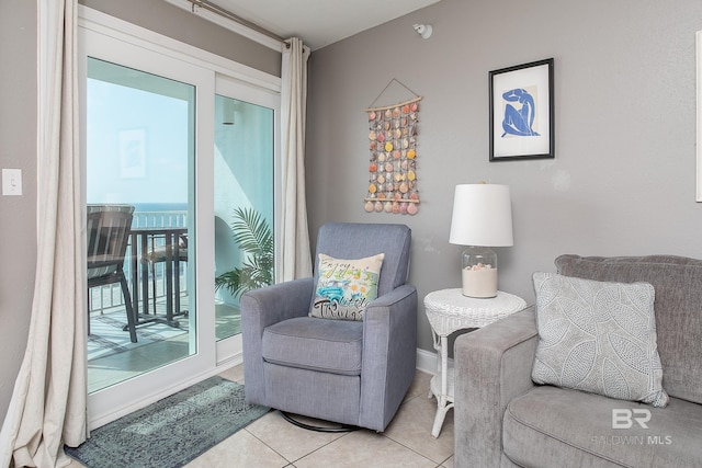 sitting room with light tile patterned floors