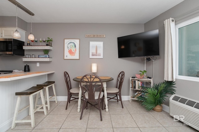 tiled dining area with heating unit