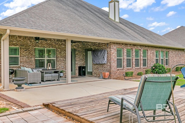 view of patio / terrace featuring ceiling fan and an outdoor hangout area