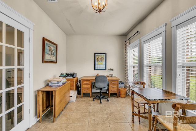 office area with an inviting chandelier and light tile patterned floors