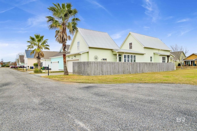 view of side of property with a garage