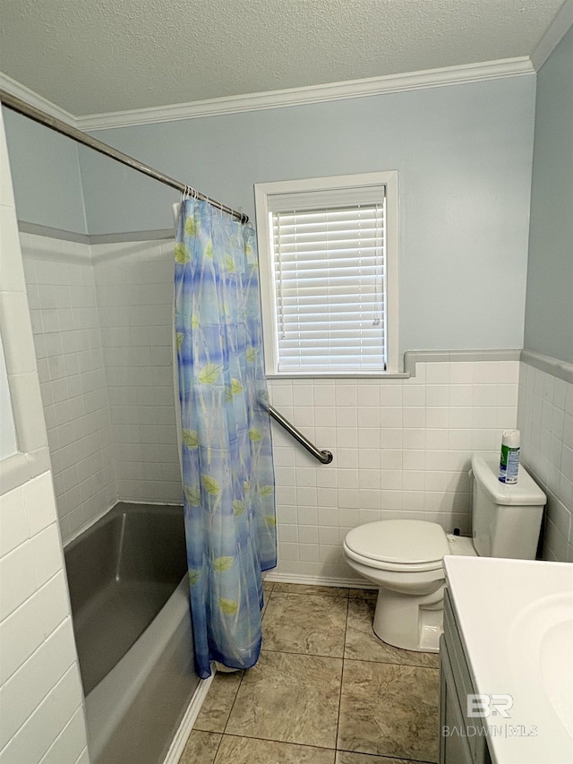 full bathroom with ornamental molding, vanity, shower / bathtub combination with curtain, and a textured ceiling