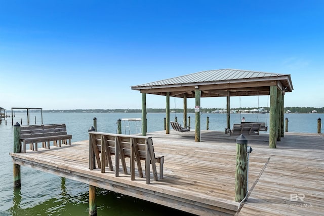 view of dock with a water view