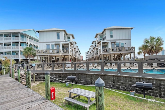 dock area featuring a community pool