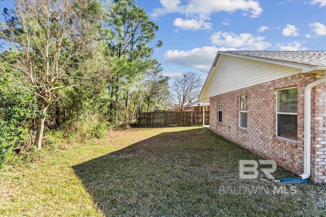 view of yard featuring fence