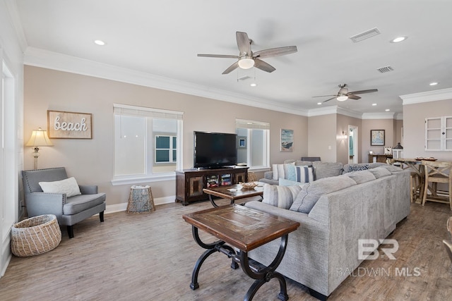 1402 W Dune Dr, Gulf Shores, AL 36542 - living room featuring a ceiling fan, wood finished floors, visible vents, and recessed lighting