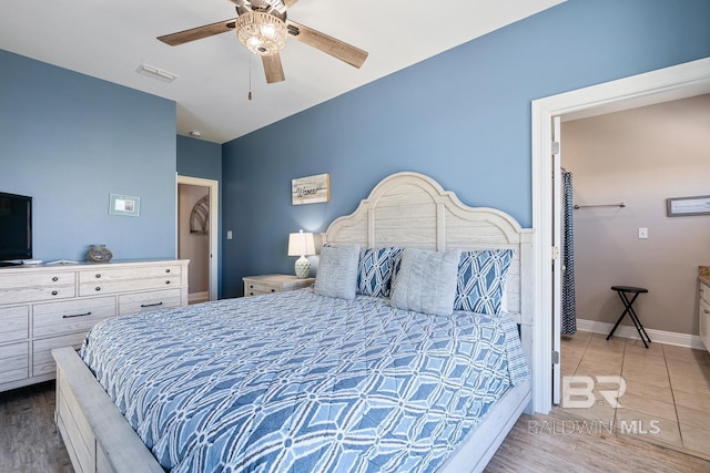 1402 W Dune Dr, Gulf Shores, AL 36542 - bedroom featuring visible vents, a ceiling fan, and baseboards