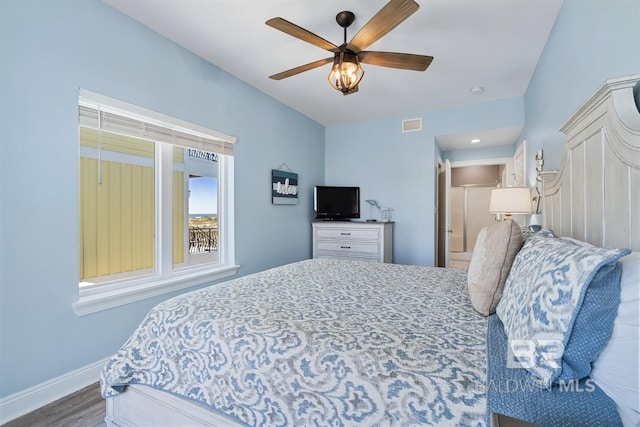 1402 W Dune Dr, Gulf Shores, AL 36542 - bedroom with baseboards, wood finished floors, visible vents, and ceiling fan
