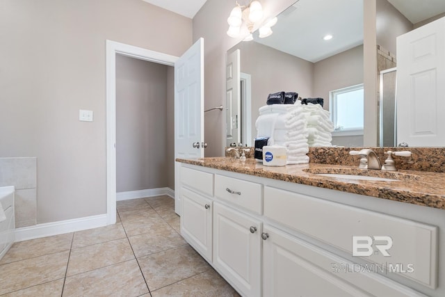 1402 W Dune Dr, Gulf Shores, AL 36542 - full bath featuring tile patterned flooring, a sink, double vanity, and a stall shower
