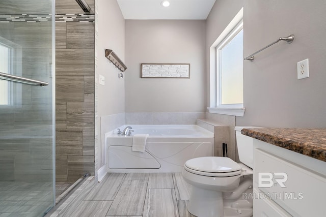 1402 W Dune Dr, Gulf Shores, AL 36542 - full bathroom with a shower stall, toilet, a bath, and vanity