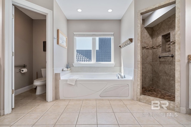 1402 W Dune Dr, Gulf Shores, AL 36542 - full bath featuring a garden tub, toilet, tile patterned floors, and a walk in shower