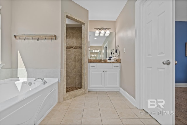1402 W Dune Dr, Gulf Shores, AL 36542 - full bath with a bath, vanity, tile patterned flooring, and tiled shower