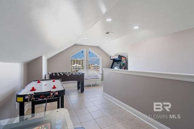 1402 W Dune Dr, Gulf Shores, AL 36542 - recreation room featuring baseboards, visible vents, recessed lighting, lofted ceiling, and light tile patterned floors