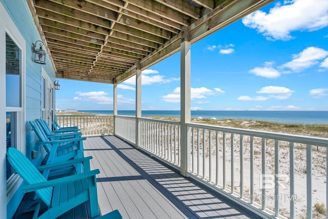 1402 W Dune Dr, Gulf Shores, AL 36542 - wooden terrace with a view of the beach and a water view