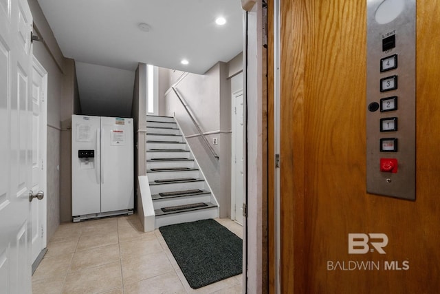 1402 W Dune Dr, Gulf Shores, AL 36542 - stairs featuring recessed lighting, elevator, and tile patterned flooring