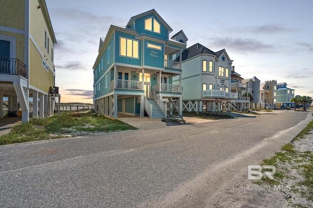 1402 W Dune Dr, Gulf Shores, AL 36542 - exterior space featuring a residential view and stairs
