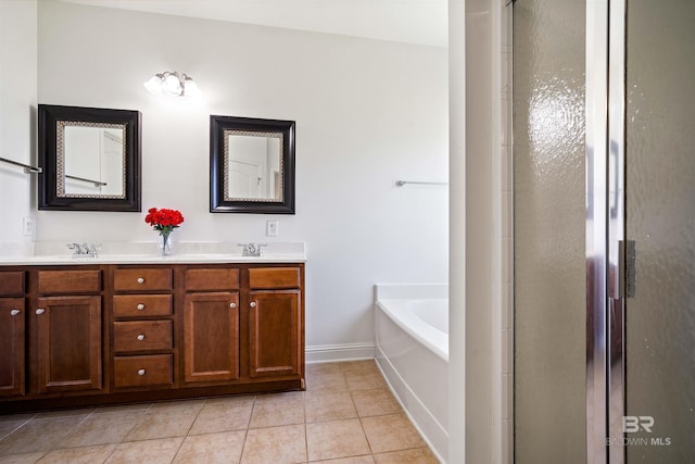 bathroom featuring baseboards, double vanity, a bath, tile patterned floors, and an enclosed shower