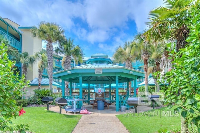 surrounding community featuring a lawn and a gazebo