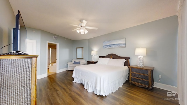 bedroom with ensuite bathroom, visible vents, baseboards, ceiling fan, and wood finished floors