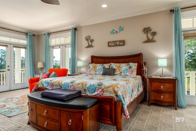 bedroom with crown molding, access to outside, light colored carpet, and multiple windows