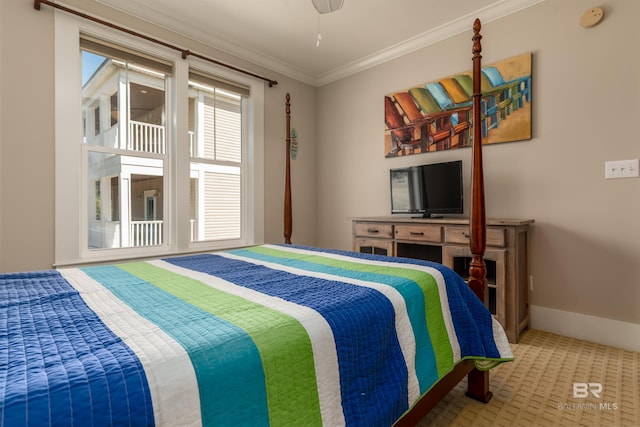 carpeted bedroom with crown molding