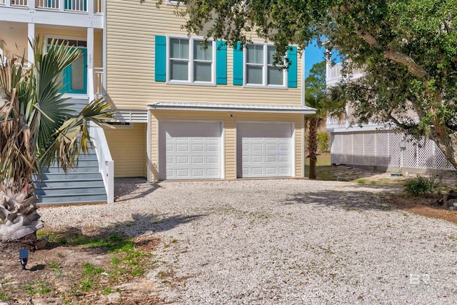 view of front of home featuring a garage