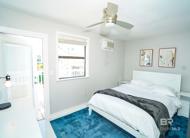 bedroom featuring ceiling fan and a wall mounted air conditioner