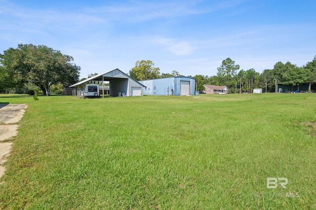 view of yard featuring a carport