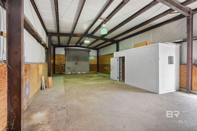 garage with wood walls