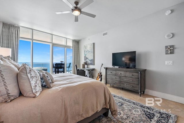 bedroom featuring a ceiling fan, baseboards, visible vents, tile patterned flooring, and access to outside