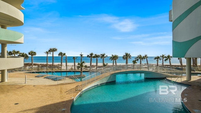 community pool with a water view