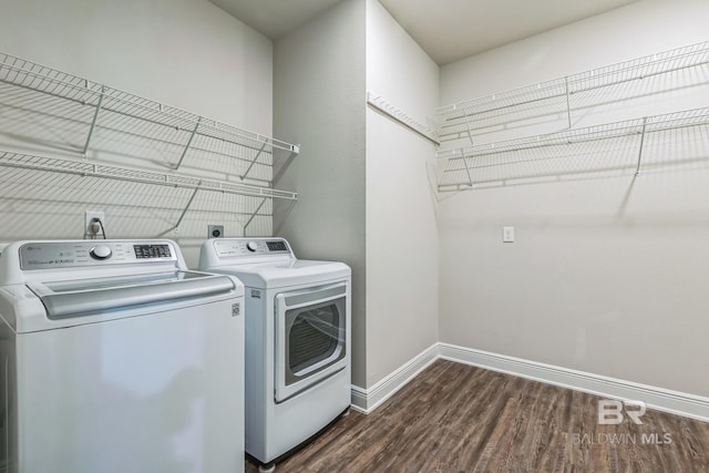 24774 Smarty Jones Cir, Daphne, AL 36526 - laundry area featuring washing machine and clothes dryer, dark wood-style floors, and baseboards