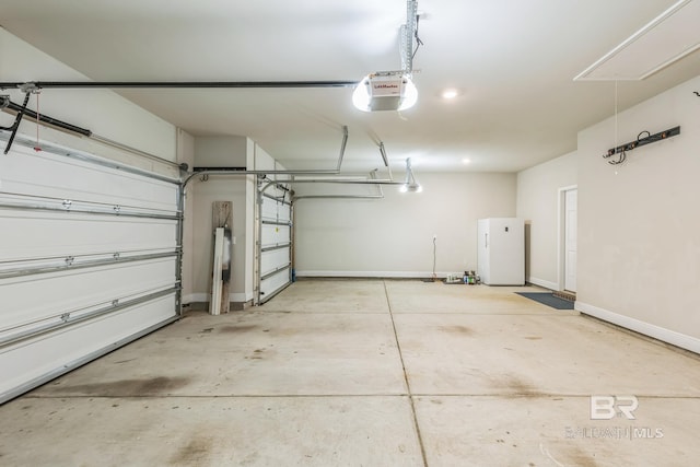 24774 Smarty Jones Cir, Daphne, AL 36526 - garage with a garage door opener and baseboards