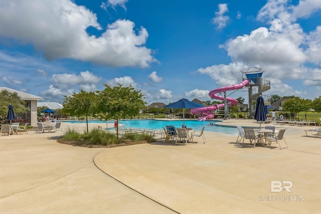 24774 Smarty Jones Cir, Daphne, AL 36526 - community pool with a water slide, fence, and a patio area
