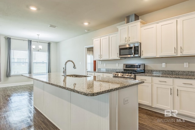 24774 Smarty Jones Cir, Daphne, AL 36526 - kitchen featuring stainless steel appliances, a sink, a kitchen island with sink, white cabinetry, and recessed lighting