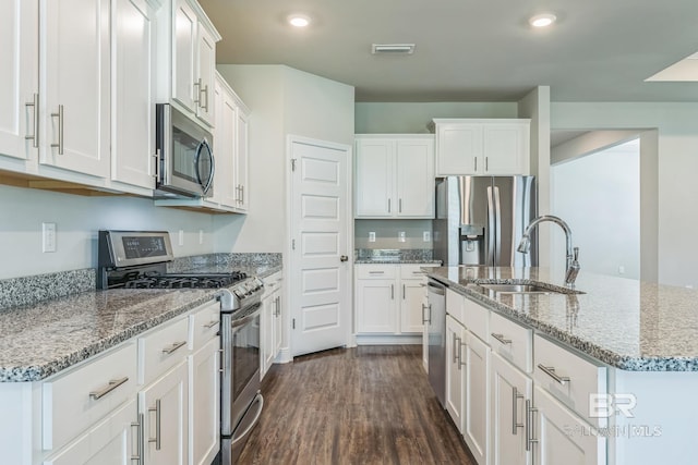 24774 Smarty Jones Cir, Daphne, AL 36526 - kitchen featuring stainless steel appliances, a sink, white cabinets, and recessed lighting