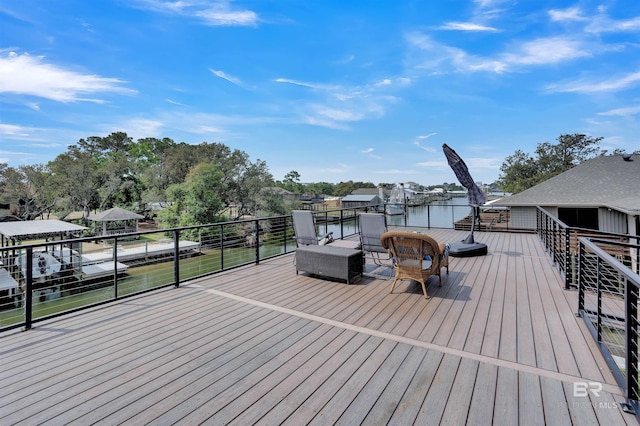 wooden deck featuring a dock