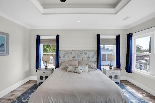 bedroom with dark hardwood / wood-style floors