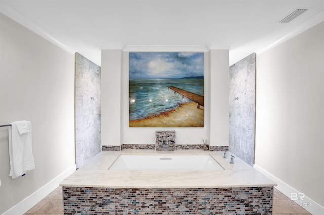 bathroom with tiled bath and tile flooring