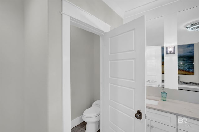 bathroom featuring oversized vanity, tile floors, and toilet